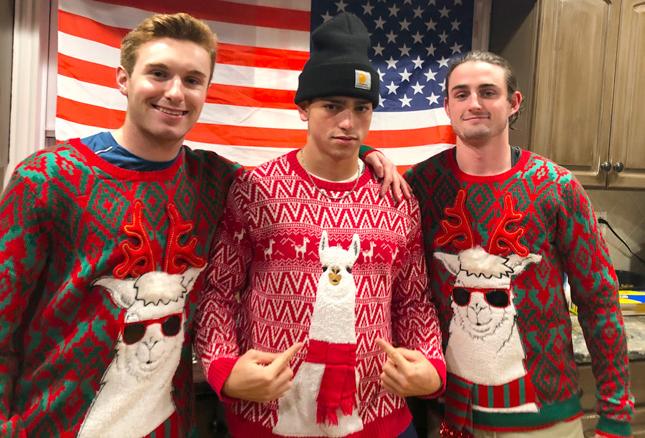 Three college students at a holiday event